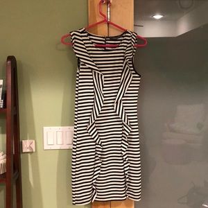 Fitted stripped dress with side ruffles